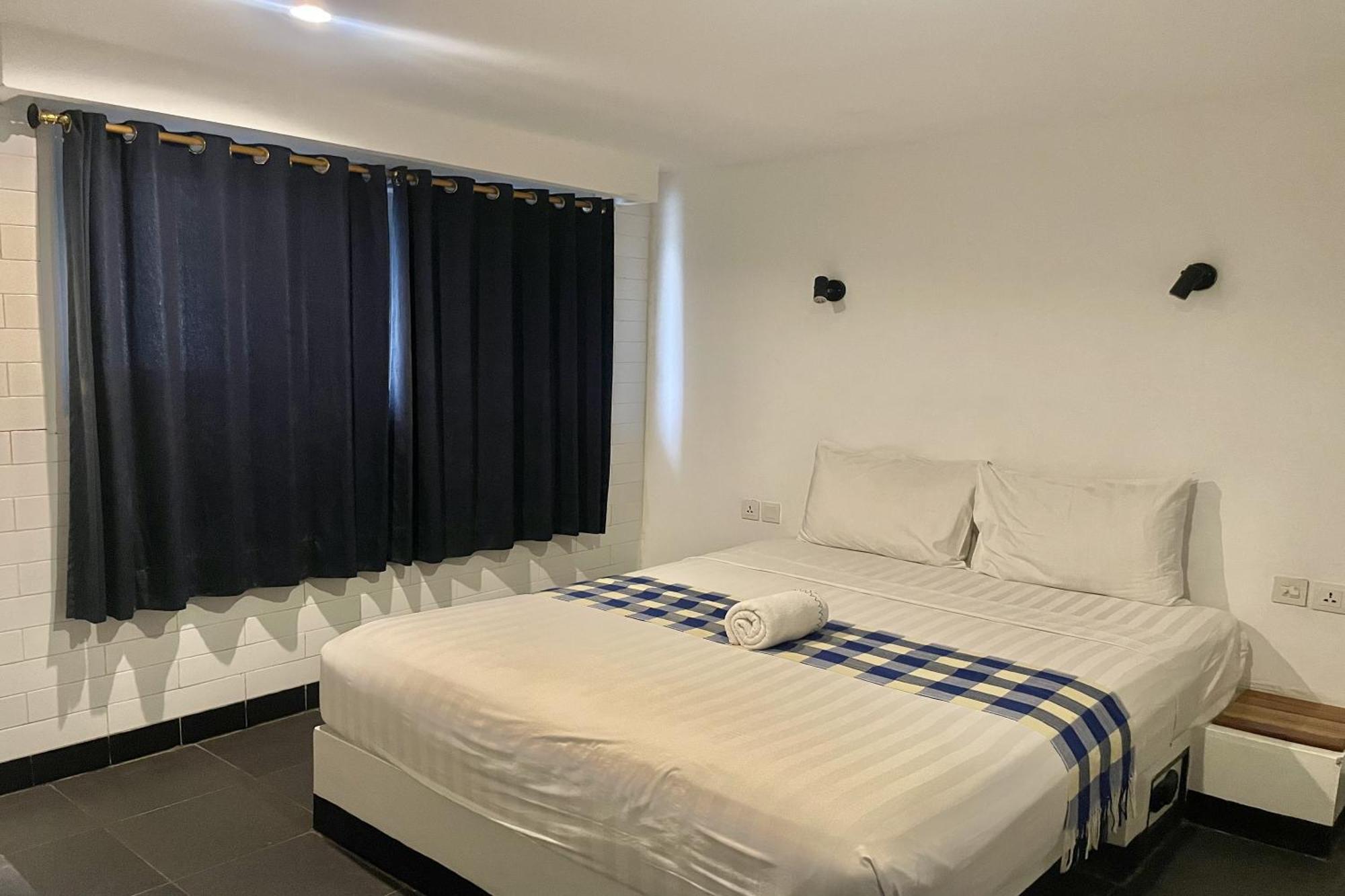 Taman Unique Hotel Сенггиги Экстерьер фото