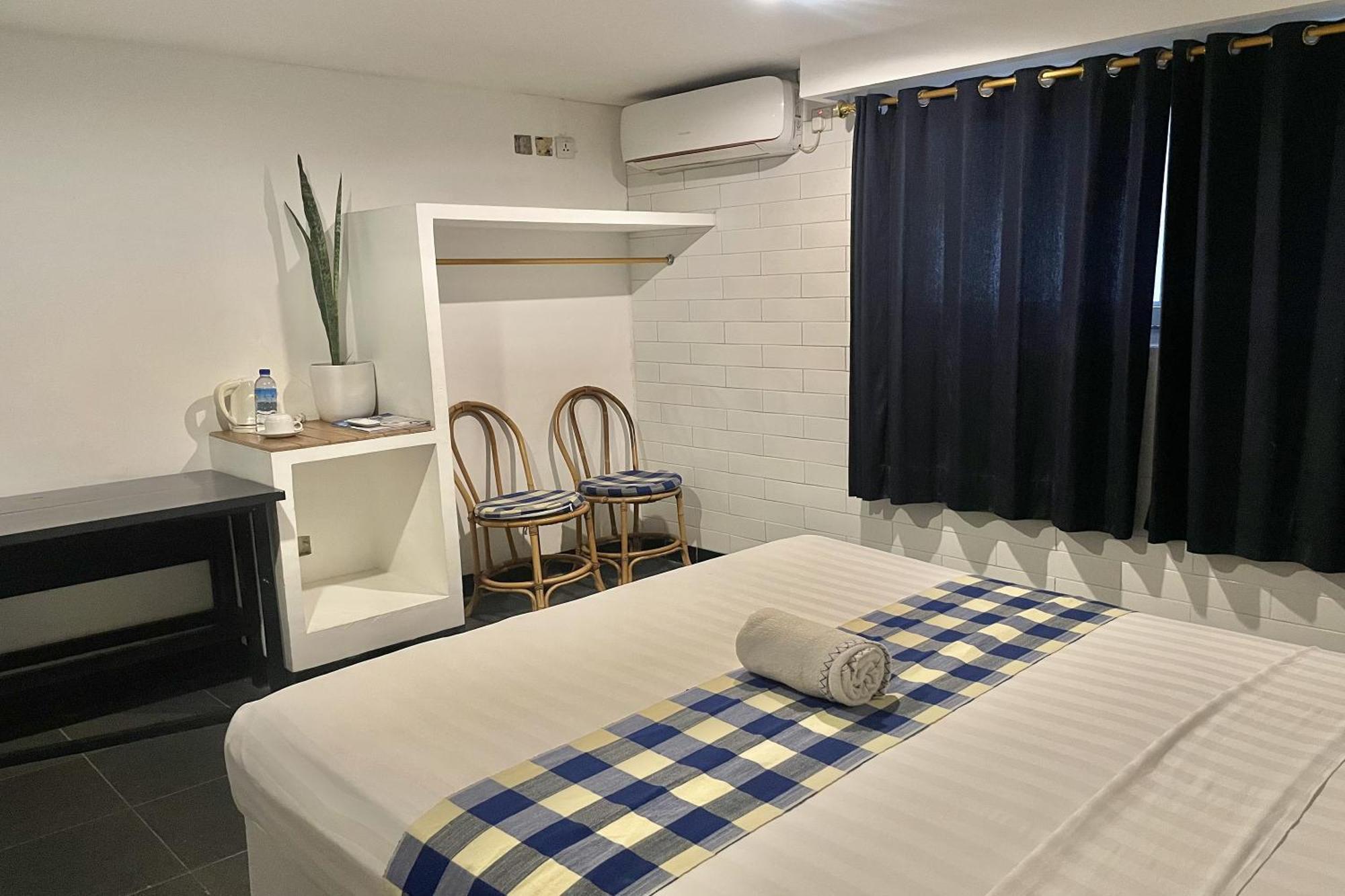 Taman Unique Hotel Сенггиги Экстерьер фото