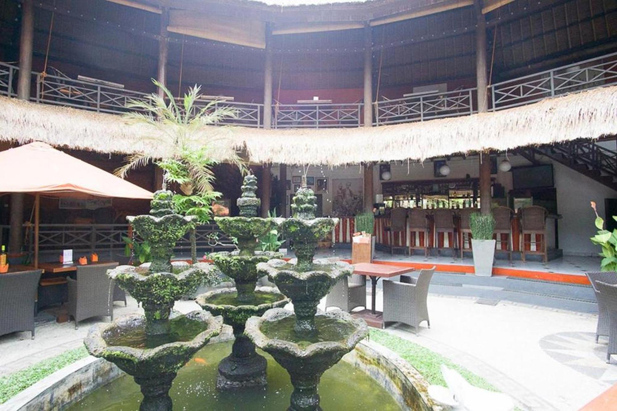 Taman Unique Hotel Сенггиги Экстерьер фото